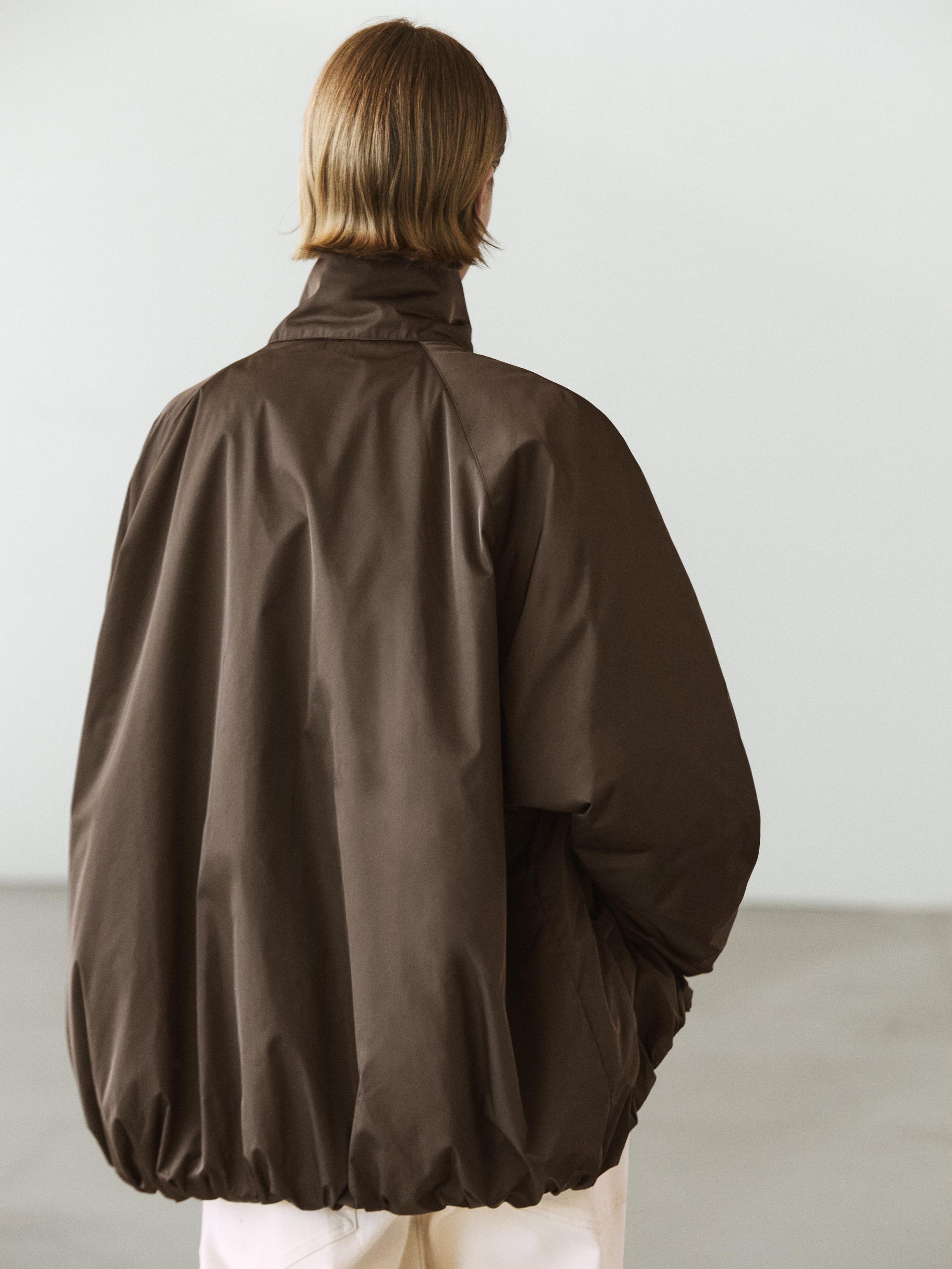 Puffer jacket with pocket details